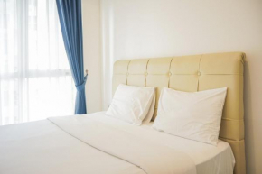 Minimalist and Comfortable 1BR Casa De Parco Apartment By Travelio
